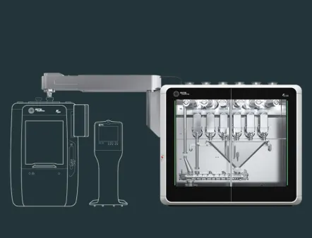 Abb. 1:  Das kontinuierliche Verarbeitungssystem FE CPS (rechts) bildet zusammen mit einer Tablettenpresse (links) eine Direktverpressungsanlage für Continuous Manufacturing.